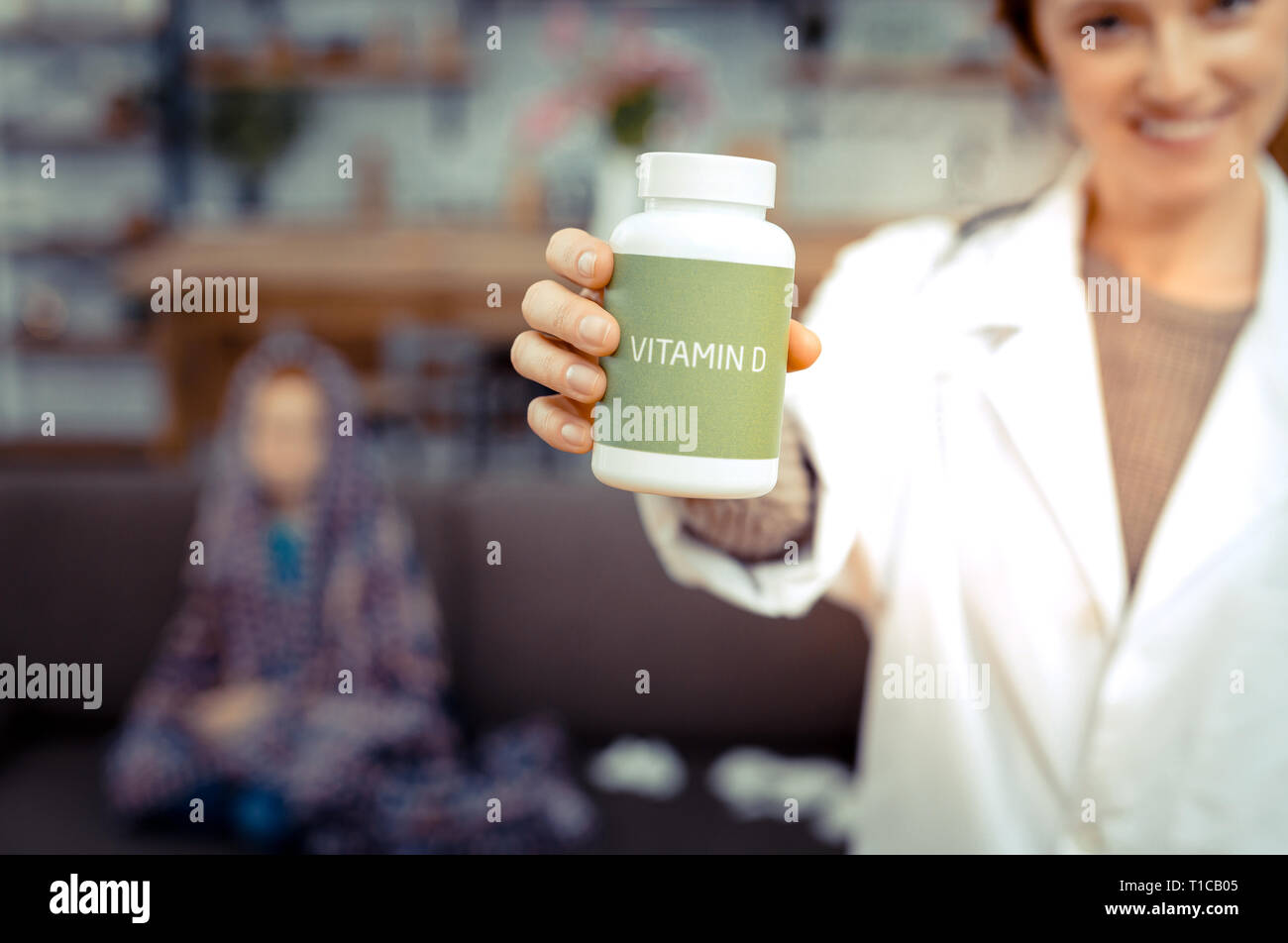 Focus sélectif d'une bouteille avec la vitamine D Banque D'Images