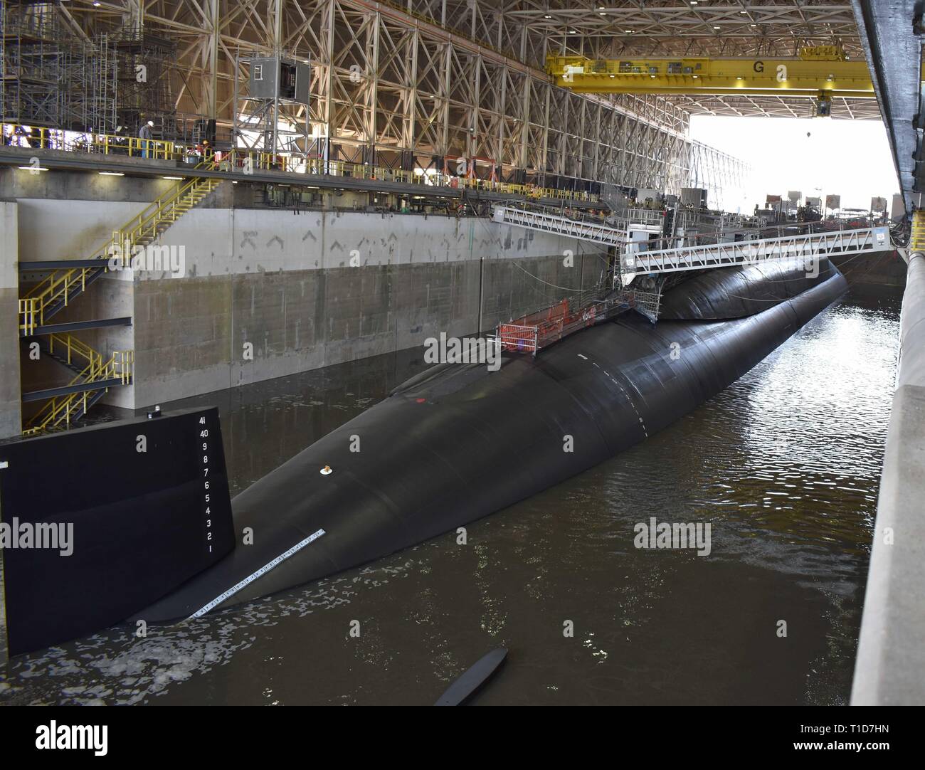 L'Ohio-classe de sous-marins lance-missiles USS Alabama (SSGN 729) se prépare à quitter la cale sèche à Naval Submarine Base Kings Bay, en Géorgie, à la suite d'une longue période de reposer. La Géorgie est l'un des deux sous-marins lance-missiles stationnés à la base et est capable de supporter jusqu'à 154 missiles Tomahawk Land Attack. Banque D'Images