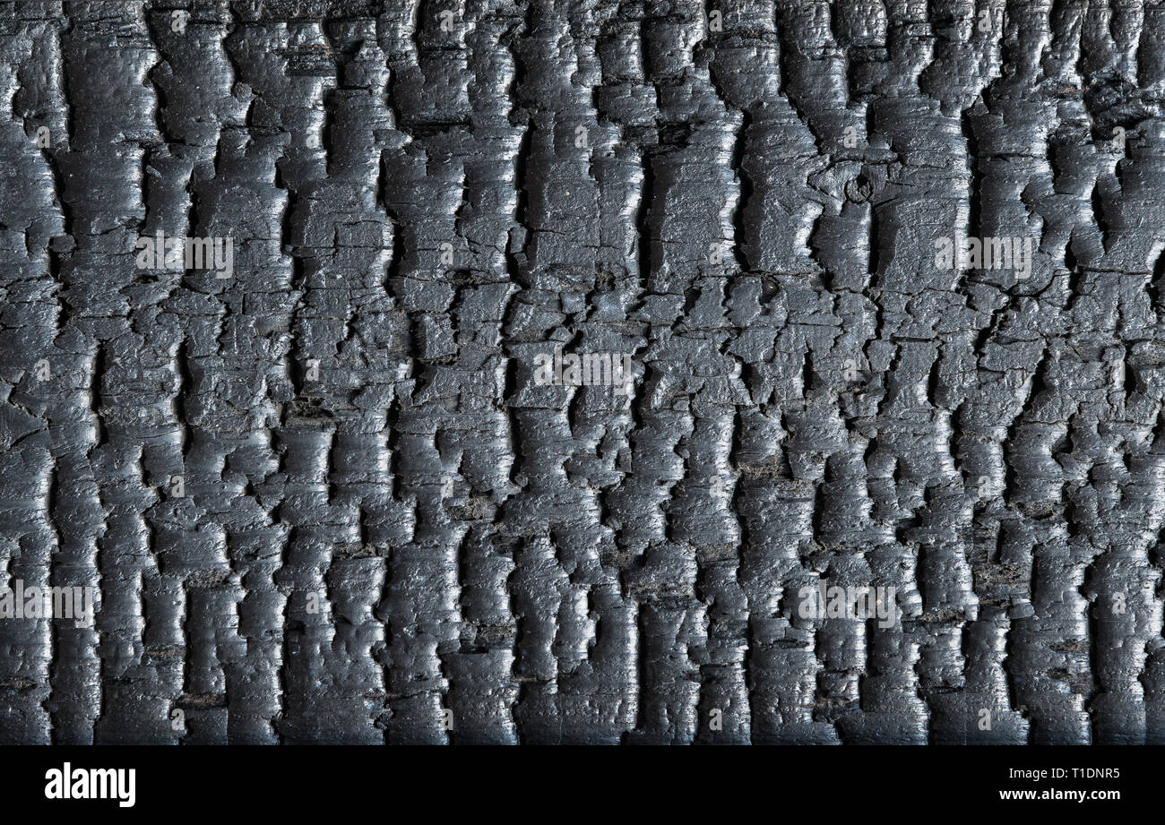 Le noir et le bois brûlé comme arrière-plan de surface Banque D'Images