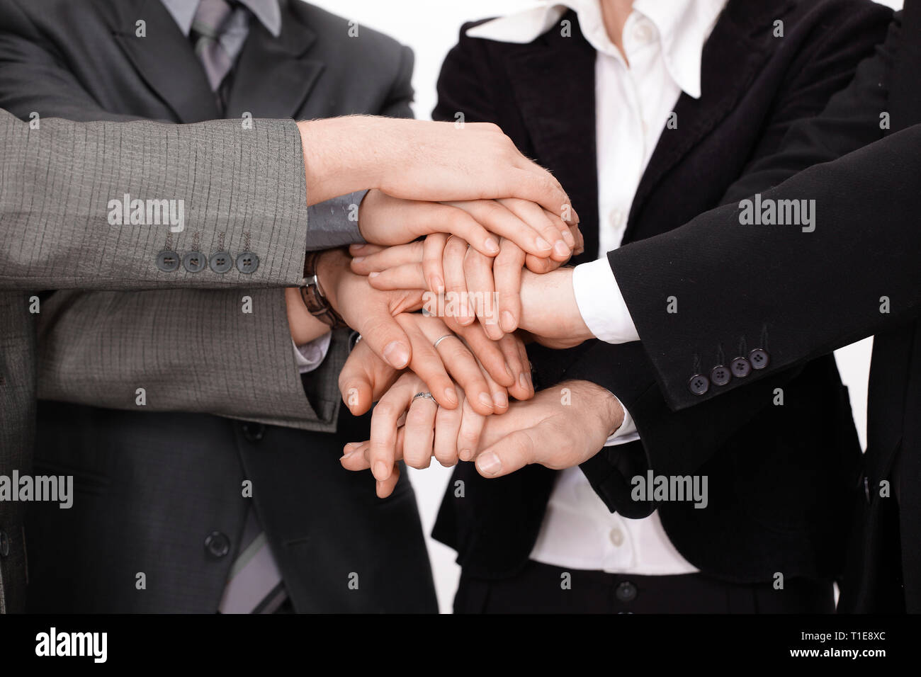 Groupe de gens d'affaires avec les mains jointes ensemble. Banque D'Images