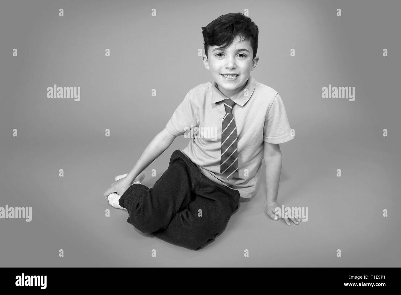 Happy Young boy in school uniform Banque D'Images