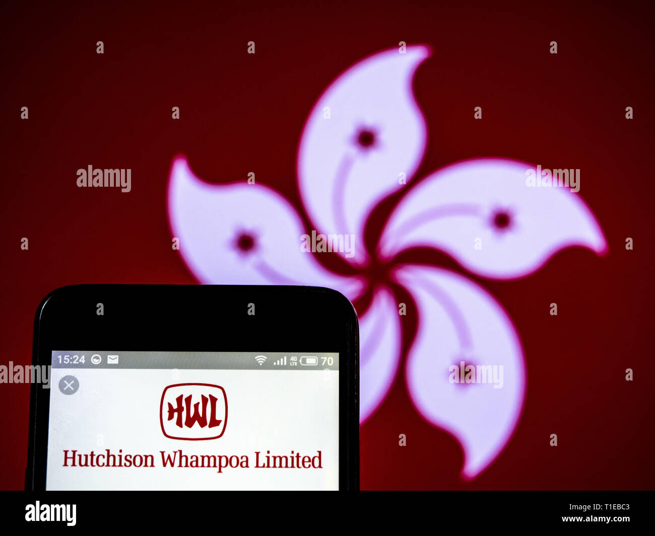 L'Ukraine. 24Th Mar, 2019. Sur cette photo, l'illustration a Hutchison Whampoa Limited vu le logo affiché sur un téléphone intelligent. Crédit : Igor Golovniov SOPA/Images/ZUMA/Alamy Fil Live News Banque D'Images