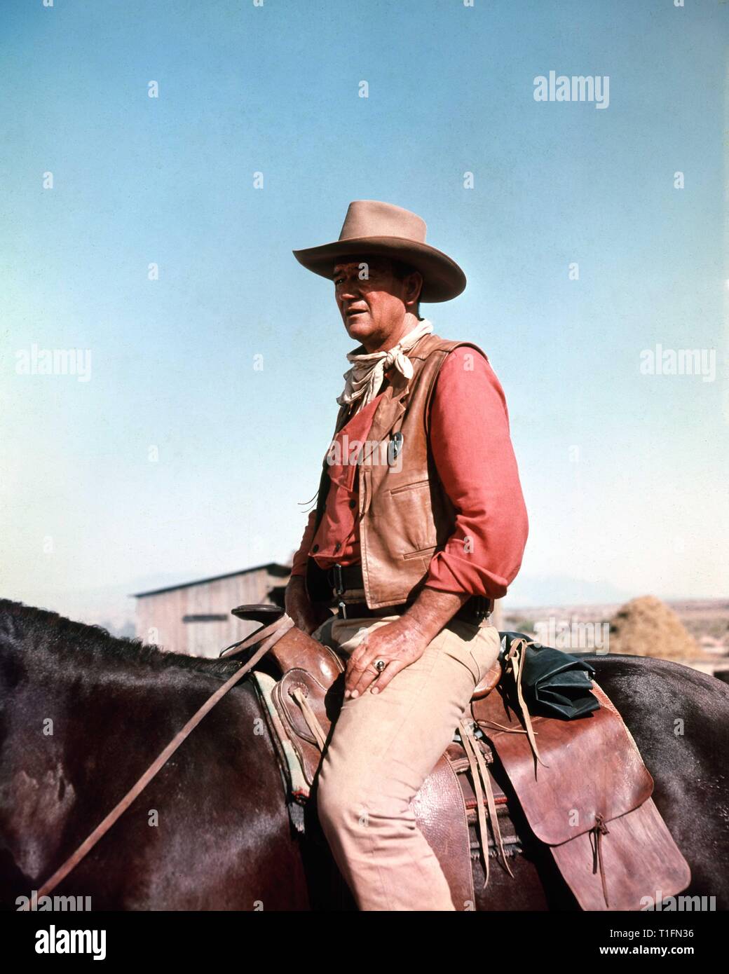JOHN WAYNE comme Texas Ranger Jake Cutter LES COMANCHEROS réalisateur Michael Curtiz 1961 Twentieth Century Fox Banque D'Images