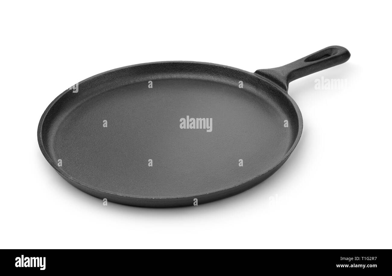 Plaque de fer en fonte ronde pan isolated on white Banque D'Images