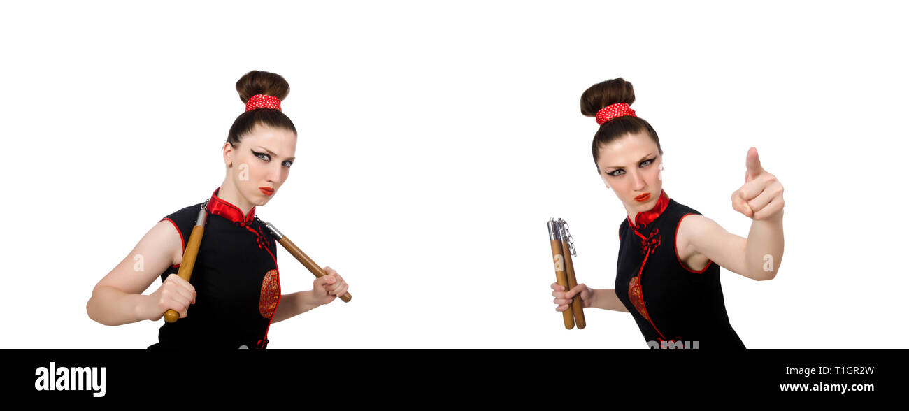 Femme drôle avec nunchucks isolated on white Banque D'Images