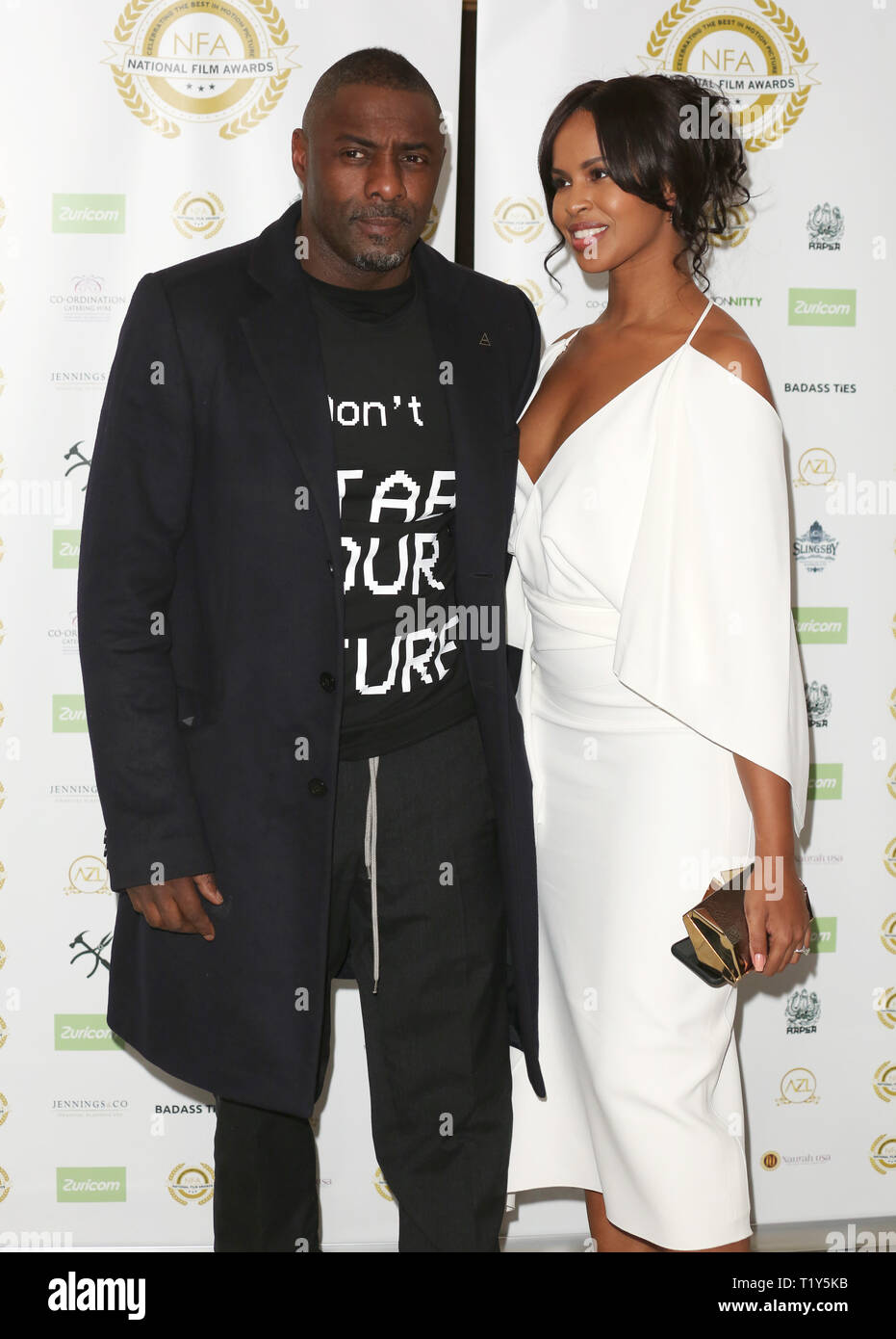 Idris Elba et Sabrina Dhowre assister à l'Office National du Film Awards 2019 à Porchester Hall à Londres Banque D'Images