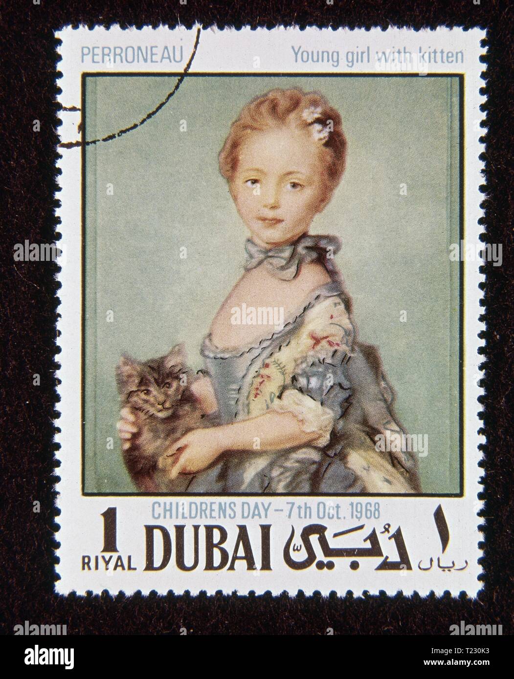 SELLO DE DUBAÏ - SERIE DIA DE LOS NIÑOS - CHICA CON GATO DE PERRONNEAU. Auteur : JEAN BAPTISTE PERRONNEAU. Banque D'Images