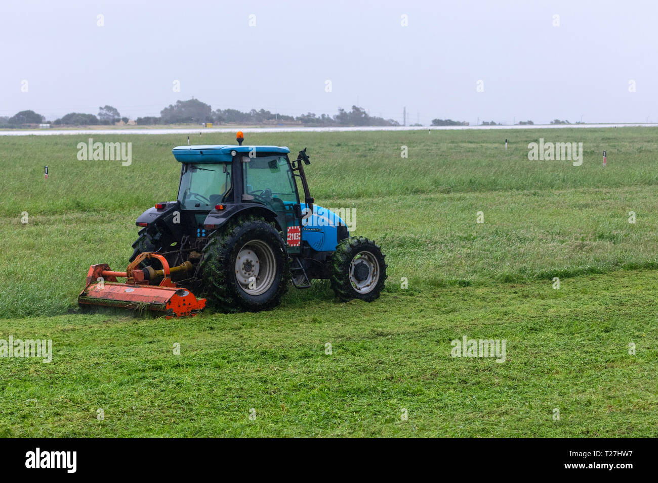 Le tracteur à l'œuvre à MIA. Banque D'Images