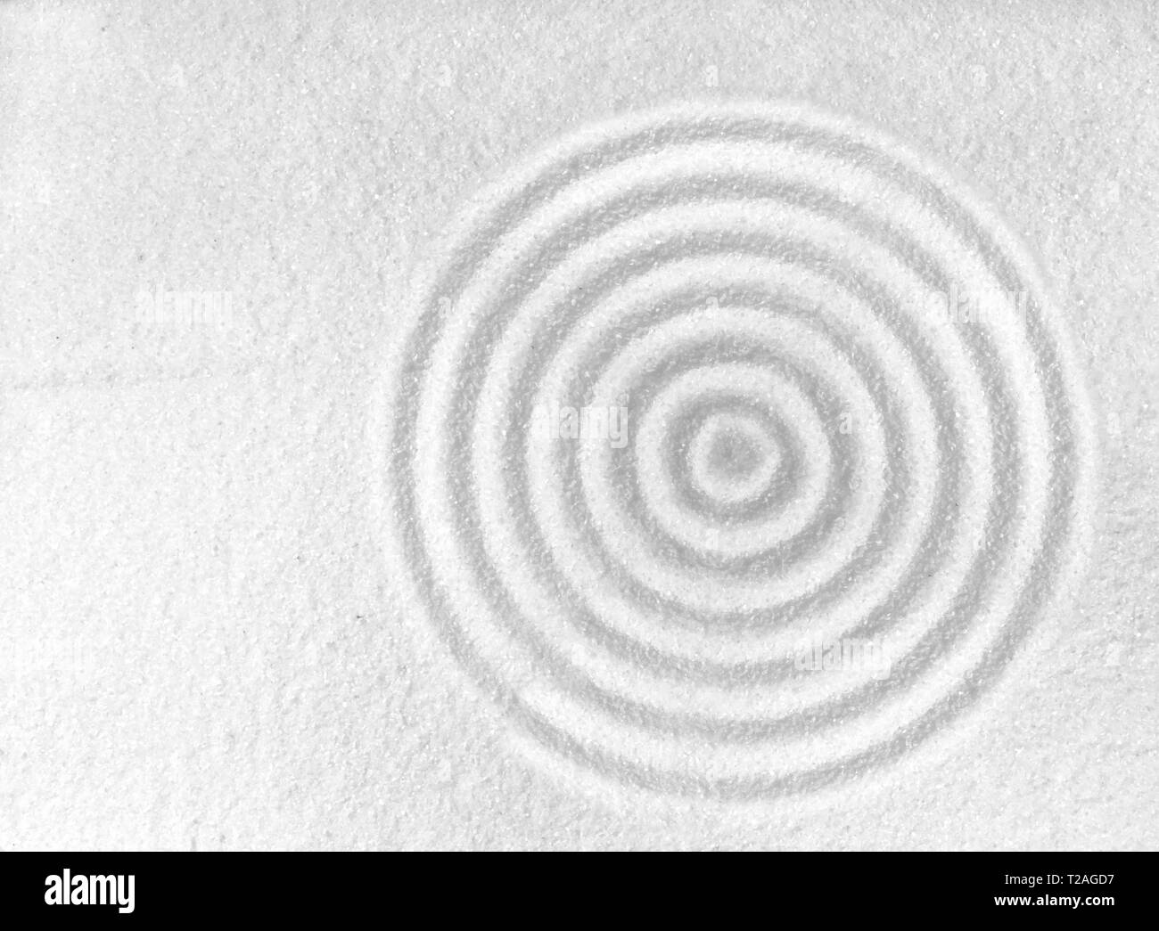Jardin zen cercle dans le sable blanc Banque D'Images