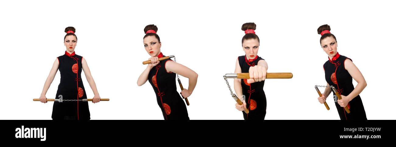 Femme drôle avec nunchucks isolated on white Banque D'Images