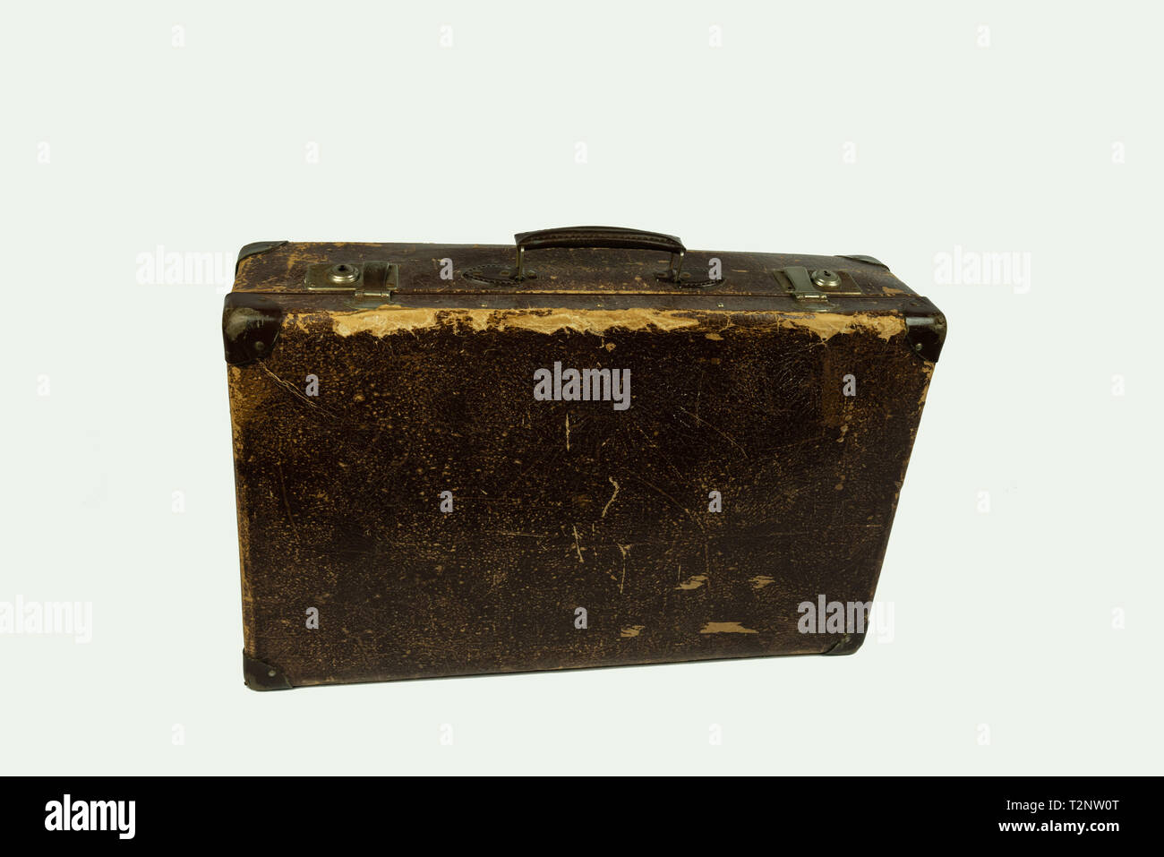 Ancienne valise en cuir vintage sur fond blanc Banque D'Images