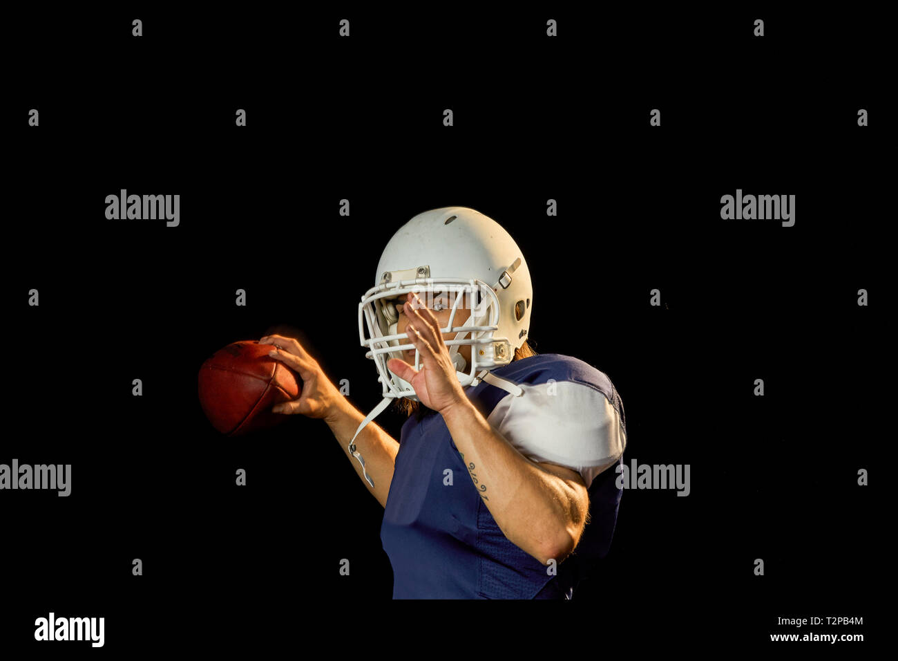 Portrait de football avec Quarterback, fond noir Banque D'Images