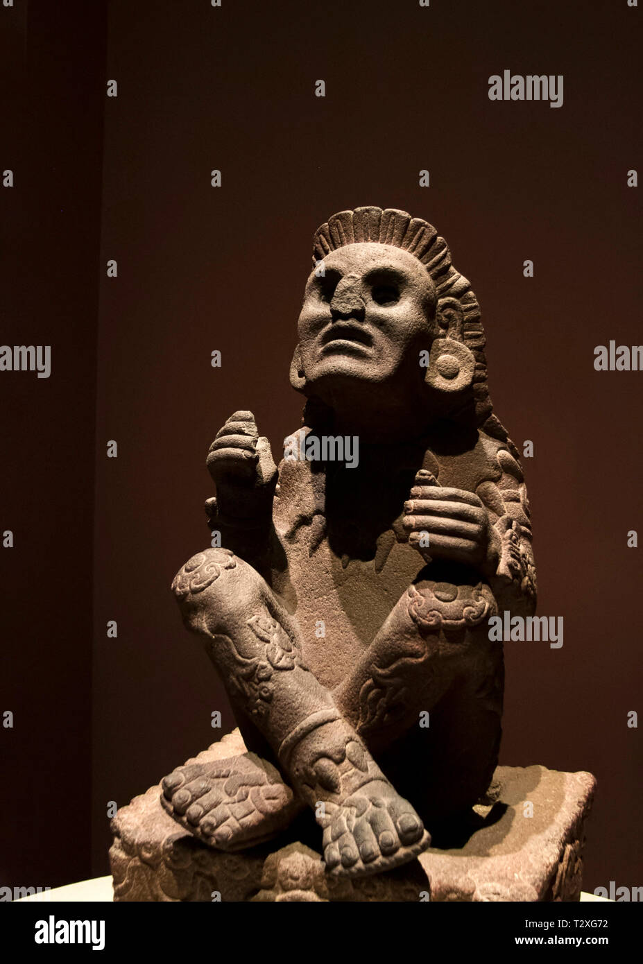 La ville de Mexico : statue en pierre de Xochipilli, dieu de l'art, des jeux, de la beauté, de la danse, les fleurs et le chant dans la mythologie aztèque. Banque D'Images