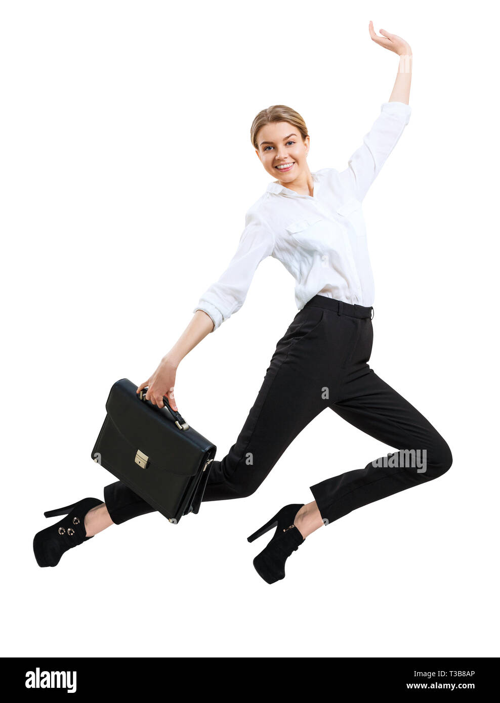 Young happy business woman jumping jusqu'à usure formelle. Banque D'Images