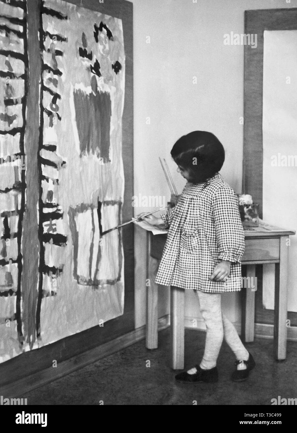 Petite fille peinture, 1962 Banque D'Images