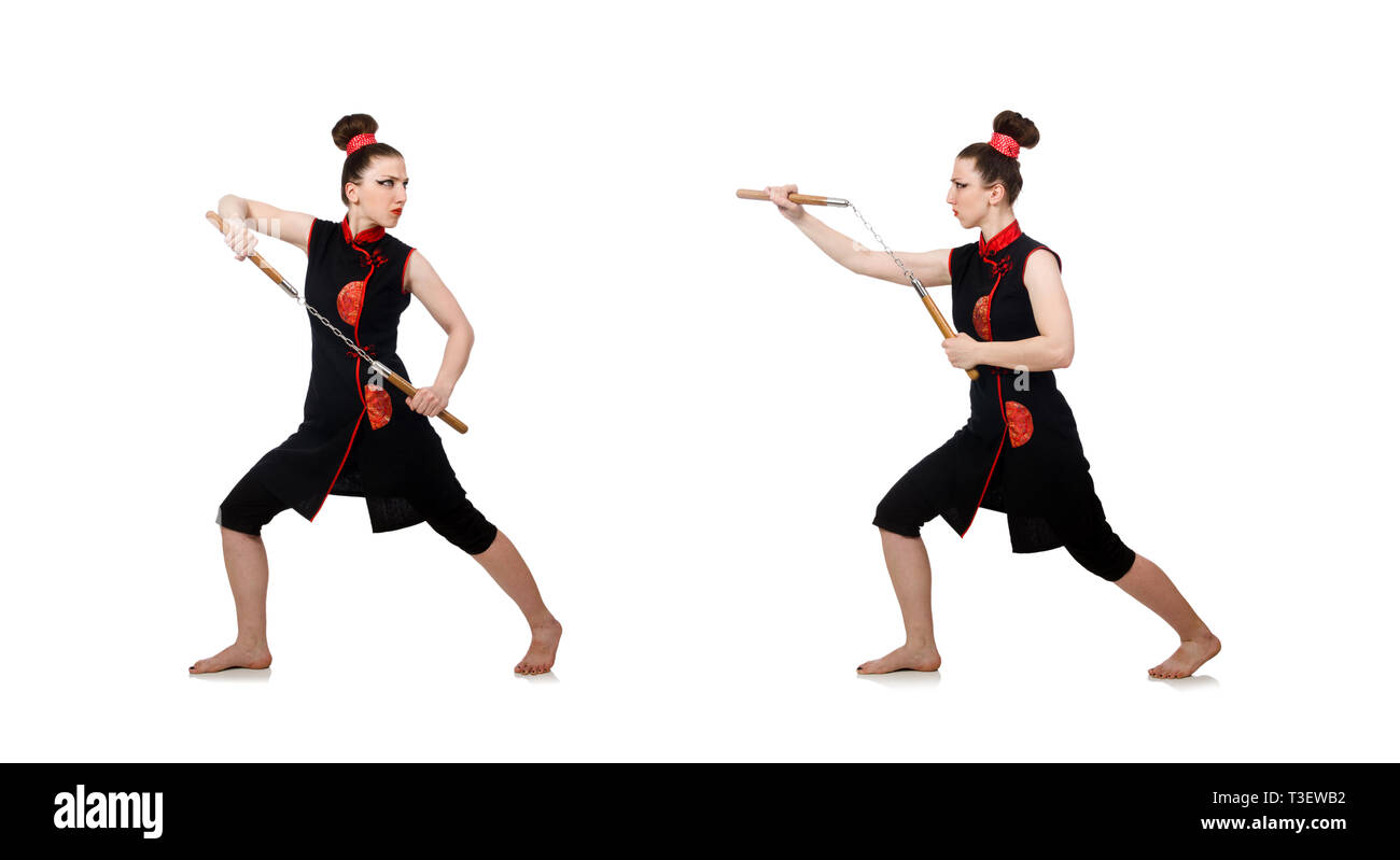 Femme drôle avec nunchucks isolated on white Banque D'Images