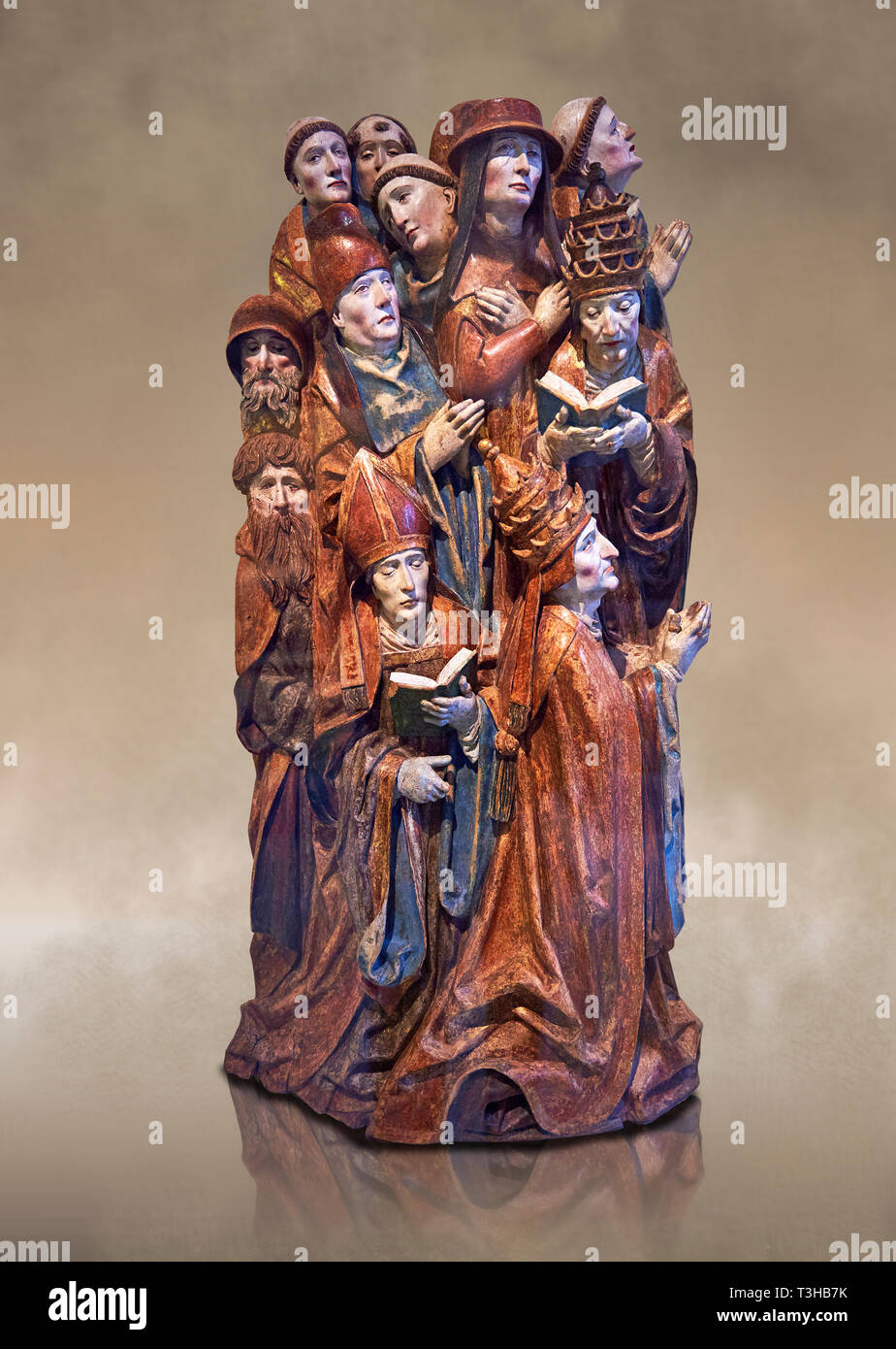 L'allégement en bois peint de retable sculpté de deux papes, un Cardinal, un évêque d'un canon et 7 prêtres priant faite en 1505 par Daniel Mauch de Ulm. Banque D'Images