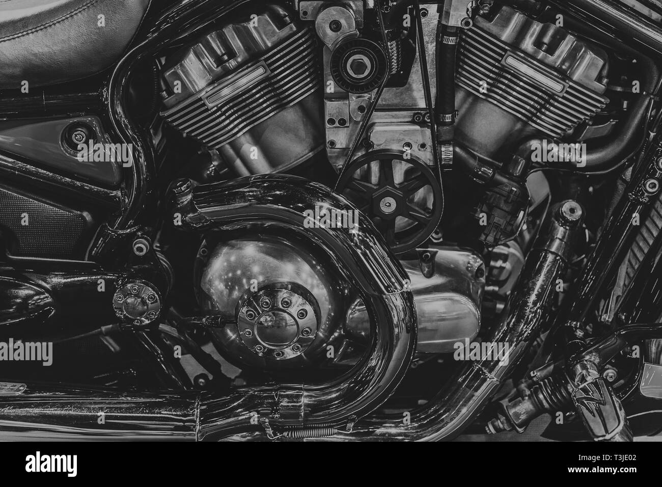 Le moteur du broyeur moto noir et blanc v-twin block. Banque D'Images