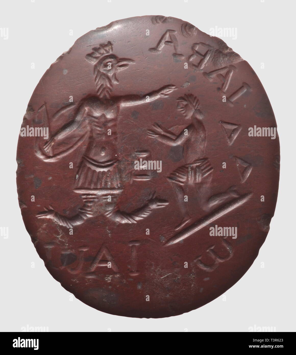 Un Roman Abraxas l'héliogravure, l'Est de la Méditerranée, 2ème/3ème siècle A.D. poli rouge incisé avec jasper, l'avers de l'image montrant une figure d'Abraxas, avec un geste de bénédiction, adorant et une inscription grecque, l'inverse avec un lion surmonté d'un croissant et de 8 étoiles. Le bord légèrement tordu. 3,2 cm de hauteur.. La figure d'Abraxas, vénéré comme un symbole de la plus haute, Dieu est basée sur l'enseignement de l'Égyptien (gnostique Basilide qui meurt en ca. 145 après J.-C.). Des amulettes comme la présente pièce étaient tenus dans la main, sous la langue ou Additional-Rights Clearance-Info , cousues--Not-Available Banque D'Images