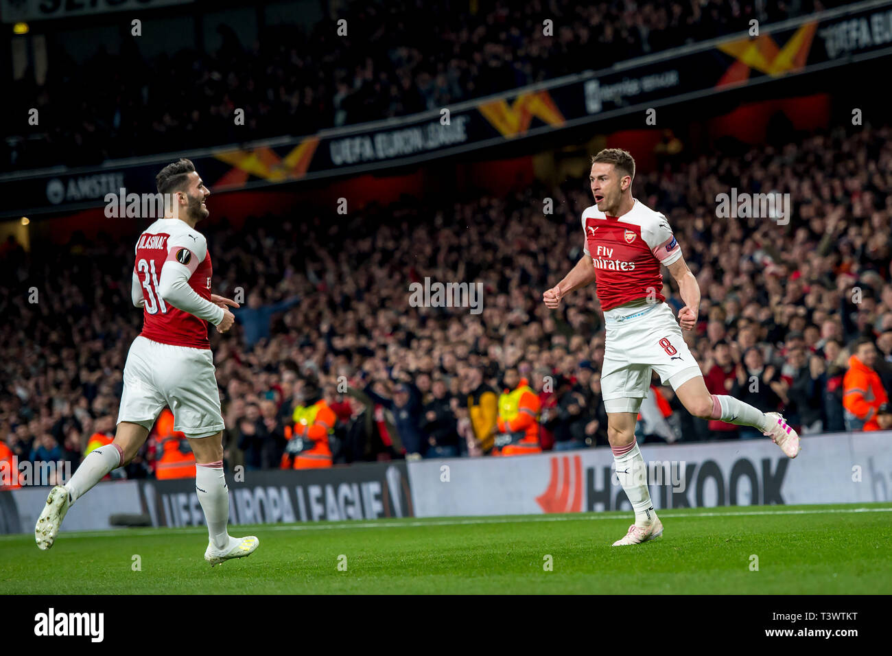 Londres, Royaume-Uni. Apr 11, 2019. Aaron Ramsey d'Arsenal célèbre marquant le premier but au cours de l'UEFA Europa League match de quart de finale entre Arsenal et Napoli à l'Emirates Stadium, Londres, Angleterre le 11 avril 2019. Photo par Salvio Calabrese. Usage éditorial uniquement, licence requise pour un usage commercial. Aucune utilisation de pari, de jeux ou d'un seul club/ligue/dvd publications. Credit : UK Sports Photos Ltd/Alamy Live News Banque D'Images