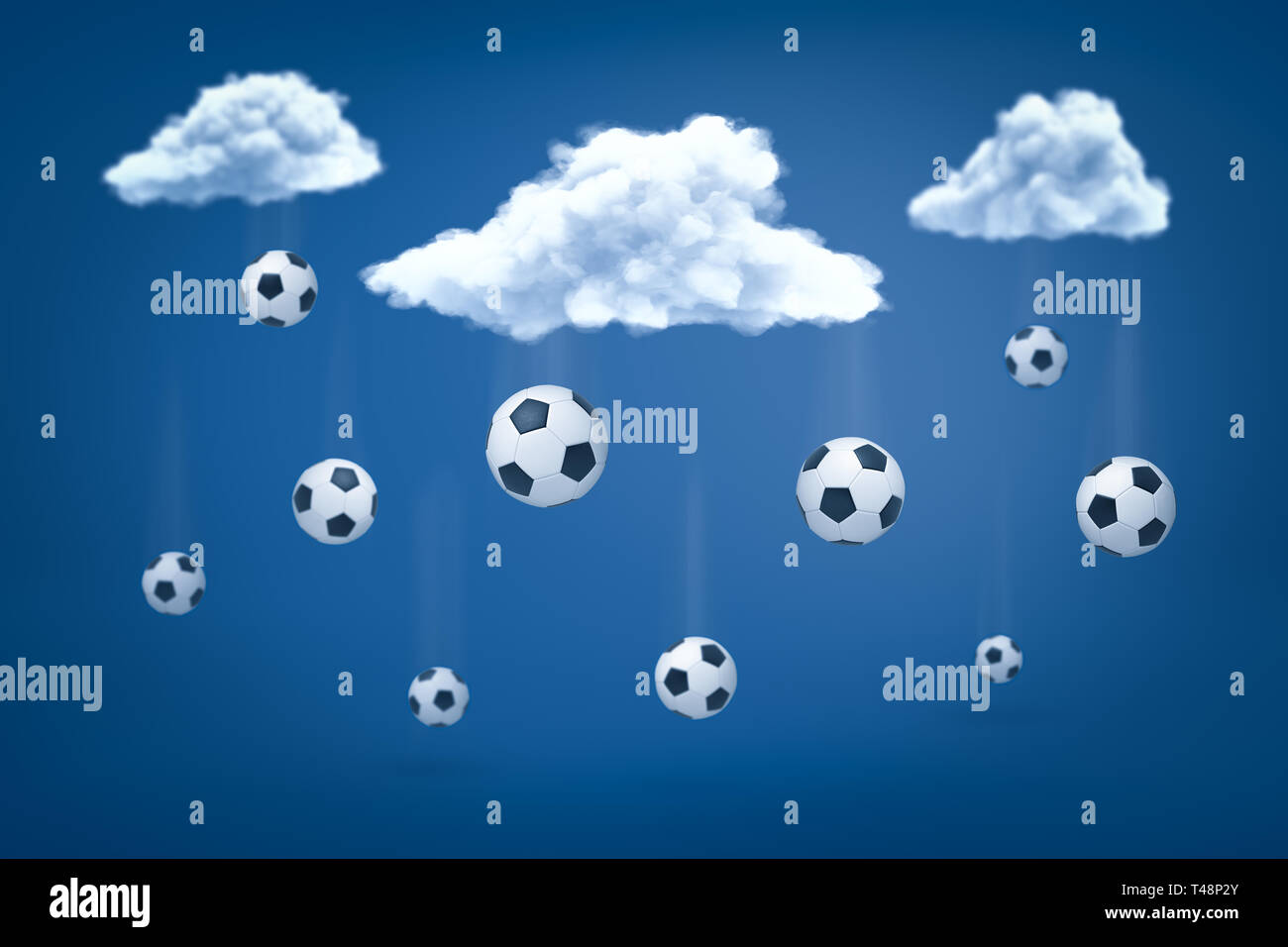 Le rendu 3D de football balles tombant à partir de nuages blancs sur fond bleu Banque D'Images