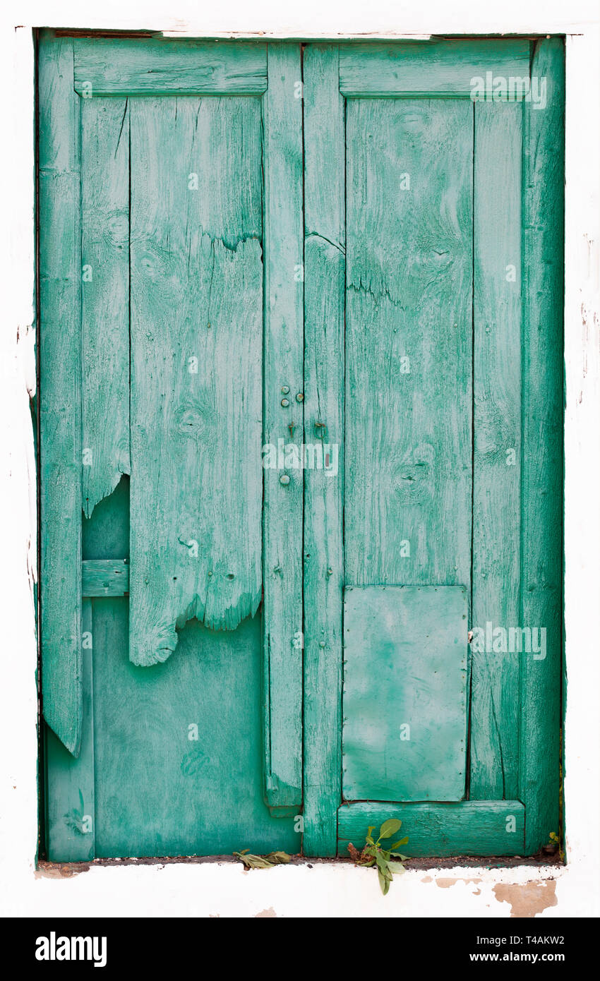 Vieille porte en bois cassée vert sur Lanzarote en Espagne Banque D'Images