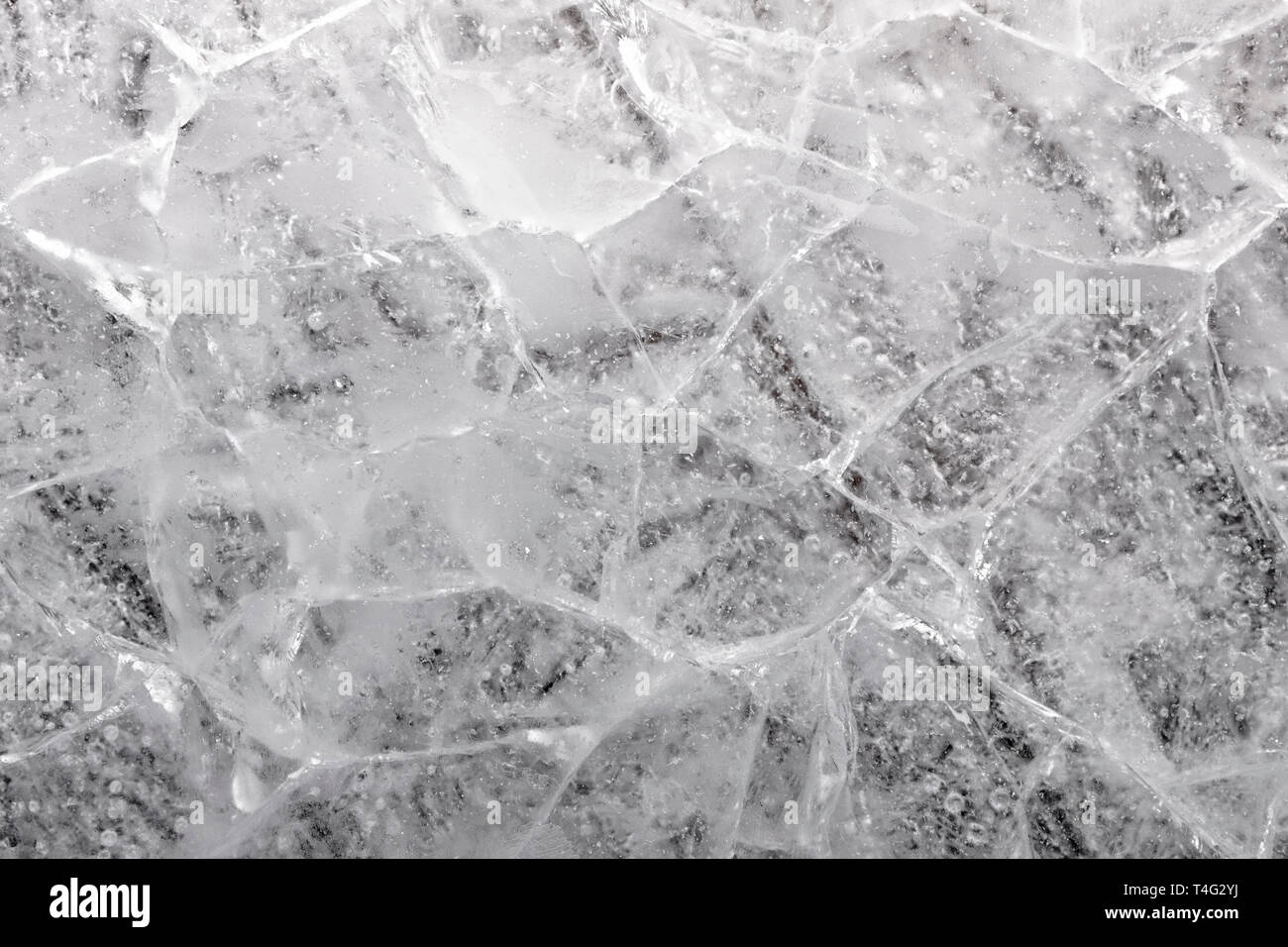 Détail d'une macro de bloc de glace fissurée. Banque D'Images