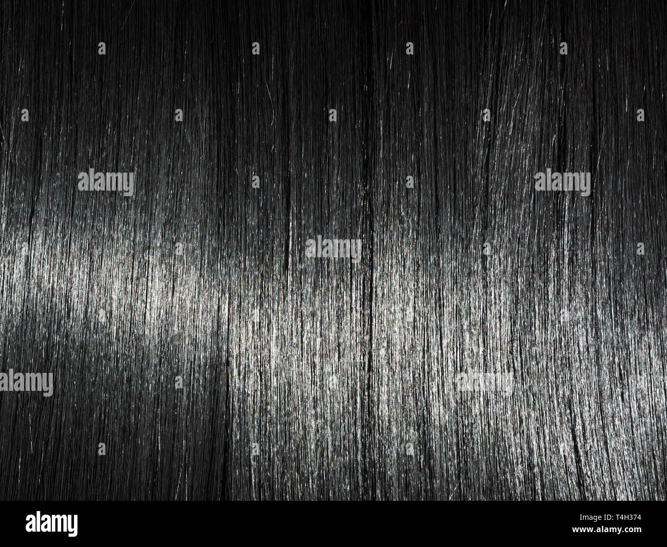 Cheveux brillant noir droit arrière-plan. Belle toile de cheveux brune lisse Banque D'Images