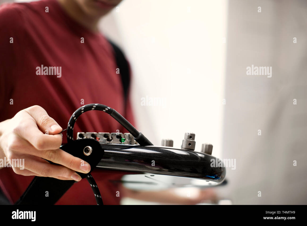 Côté réglage du câble sur une guitare électrique. Banque D'Images