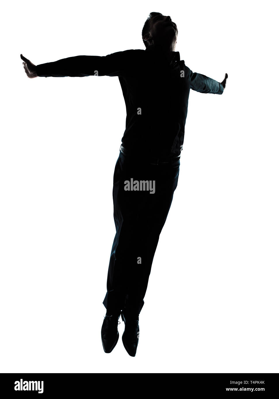 Un caucasian business man flying silhouette wellness studio pleine longueur en isolé sur fond blanc Banque D'Images