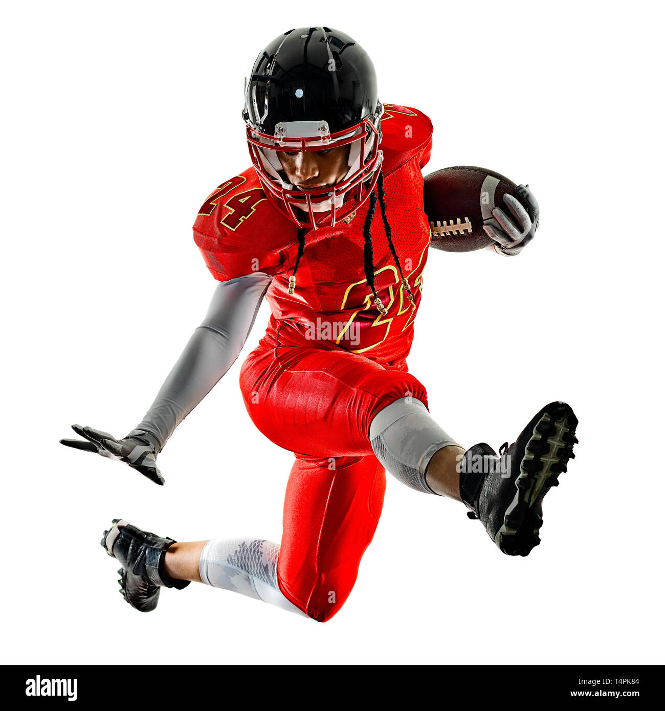 Une femme africaine adolescentes american football player isolé sur fond blanc avec des ombres silhouette Banque D'Images