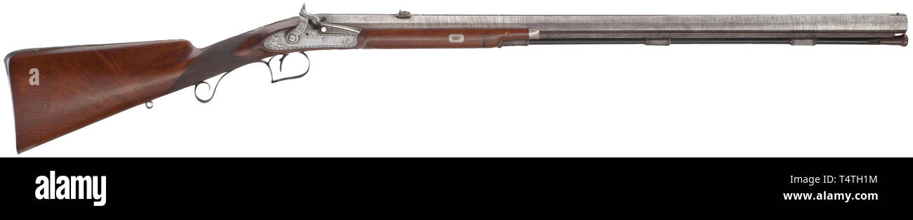 Un fusil à percussion, James Wilkinson et Fils, Londres, avant 1824. Canon octogonal, canon Damas en calibre 16,5 mm, avec deux sites fixes arrière rabattable sur le dessus, avec des sites touristiques de la signature et l'inscription 'Makers à Sa Majesté". Bloc de brevets, gravé tang. Le chien et la platine à percussion avec vrille fine gravure, la platine aussi avec la signature. L'intérieur de la platine ainsi que le fond du tiroir, le numéro de fonction '3046'. La moitié de noix avec stock joue finement quadrillée, et avec un mobilier en fer qui est gravé en , Additional-Rights Clearance-Info-Not-Available- Banque D'Images