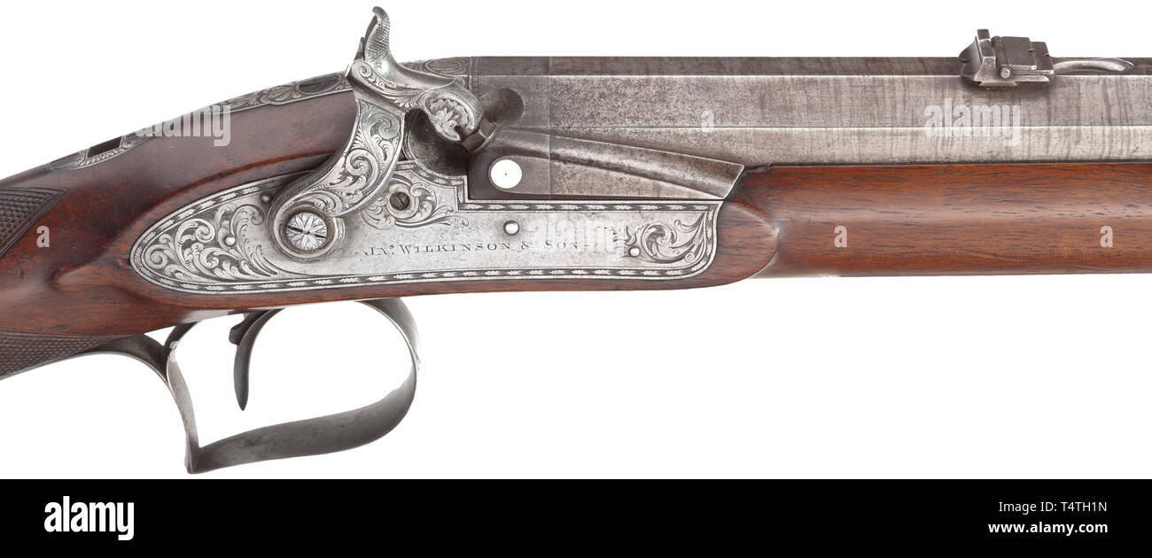 Un fusil à percussion, James Wilkinson et Fils, Londres, avant 1824. Canon octogonal, canon Damas en calibre 16,5 mm, avec deux sites fixes arrière rabattable sur le dessus, avec des sites touristiques de la signature et l'inscription 'Makers à Sa Majesté". Bloc de brevets, gravé tang. Le chien et la platine à percussion avec vrille fine gravure, la platine aussi avec la signature. L'intérieur de la platine ainsi que le fond du tiroir, le numéro de fonction '3046'. La moitié de noix avec stock joue finement quadrillée, et avec un mobilier en fer qui est gravé en , Additional-Rights Clearance-Info-Not-Available- Banque D'Images