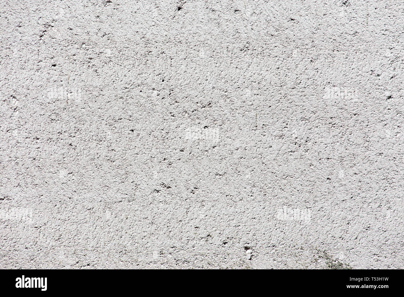 Mur en stuc blanc. La texture du mur de ciment peint en blanc Banque D'Images