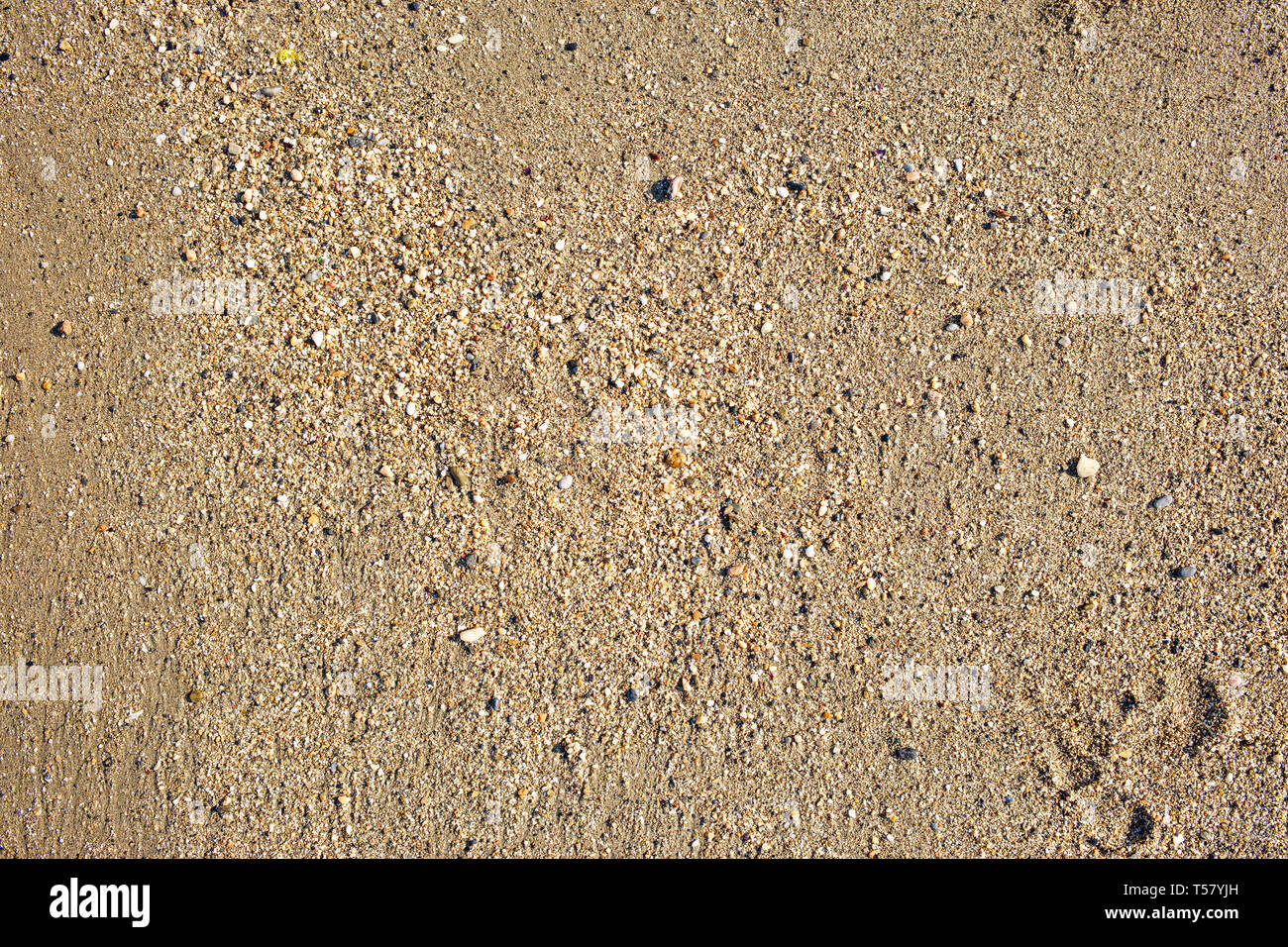 Vue de dessus de la mer, du sable propre texture de surface naturelle. Fond de sable. Banque D'Images