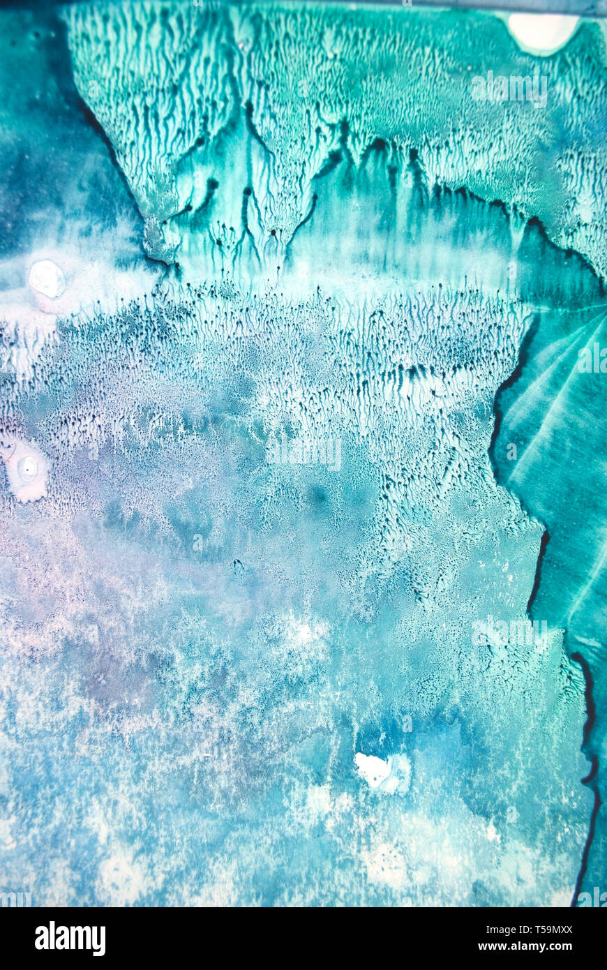 La texture aquarelle éclaboussures. Résumé d'origine, le papier, la pierre, la glace, l'espace, galaxie, la lumière cosmique les taches de couleur turquoise style blob Banque D'Images