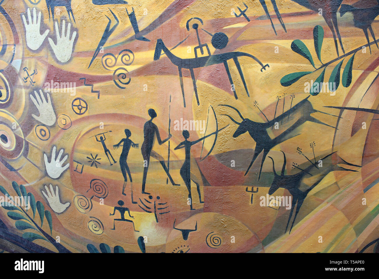 L'Art moderne dans le style d'une peinture représentant la grotte de chasse préhistorique et imprime à la main Banque D'Images