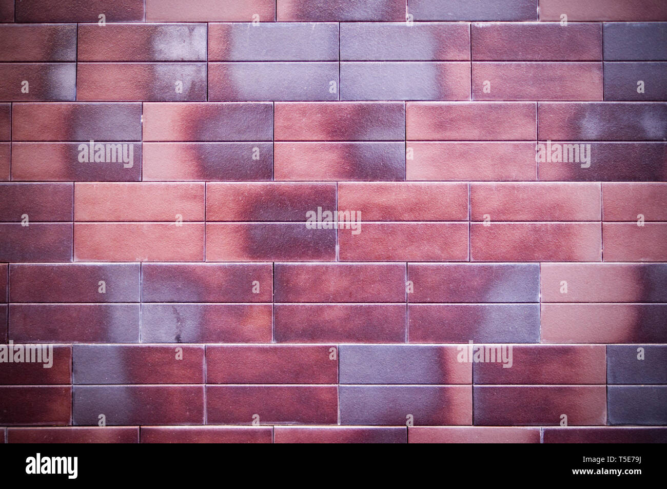 Décoration rouge-brique mur carrelé forme texture avec vignette. arrière-plan, de l'extérieur. Banque D'Images