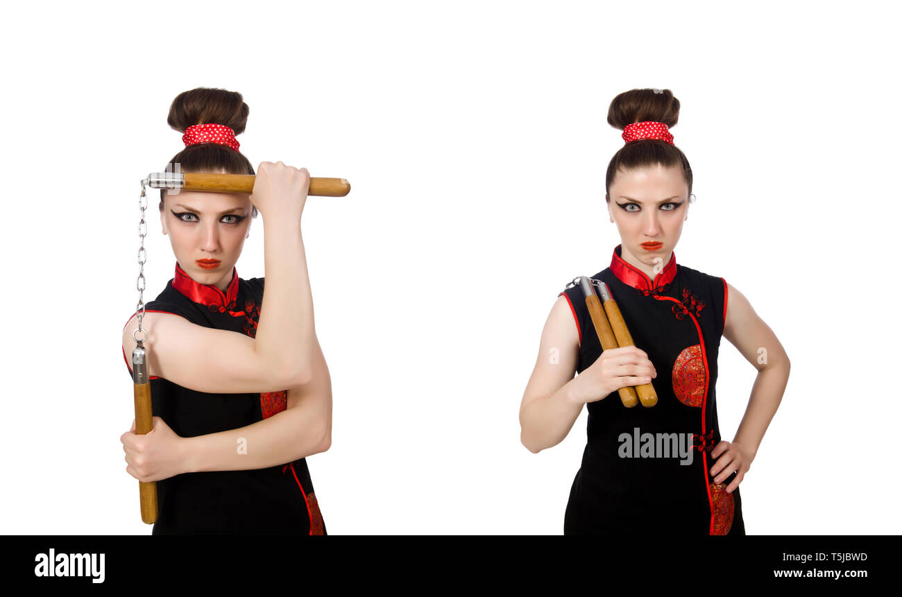 Femme drôle avec nunchucks isolated on white Banque D'Images