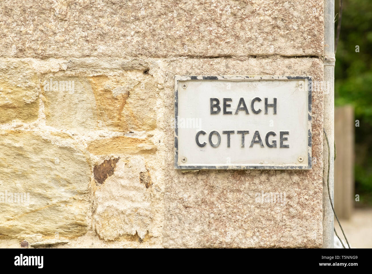 Nom de maison signe sur mur dans village Durgan, Cornwall, Angleterre Banque D'Images