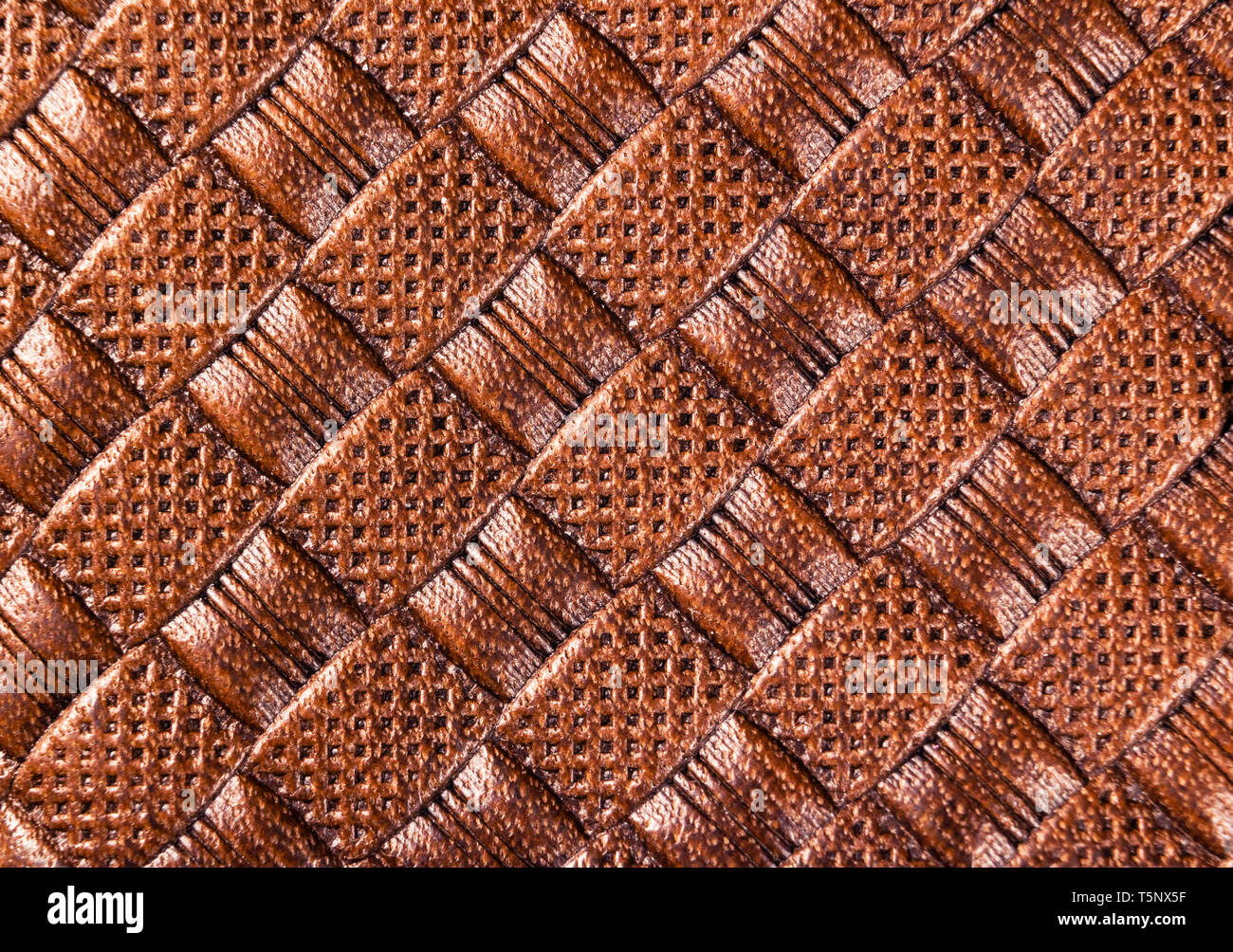 Brown texture de cuir perforé. Close up shot. Fond en cuir. Un plan macro. L'apparence de cuir véritable. Modèle en cuir avec copie espace Banque D'Images