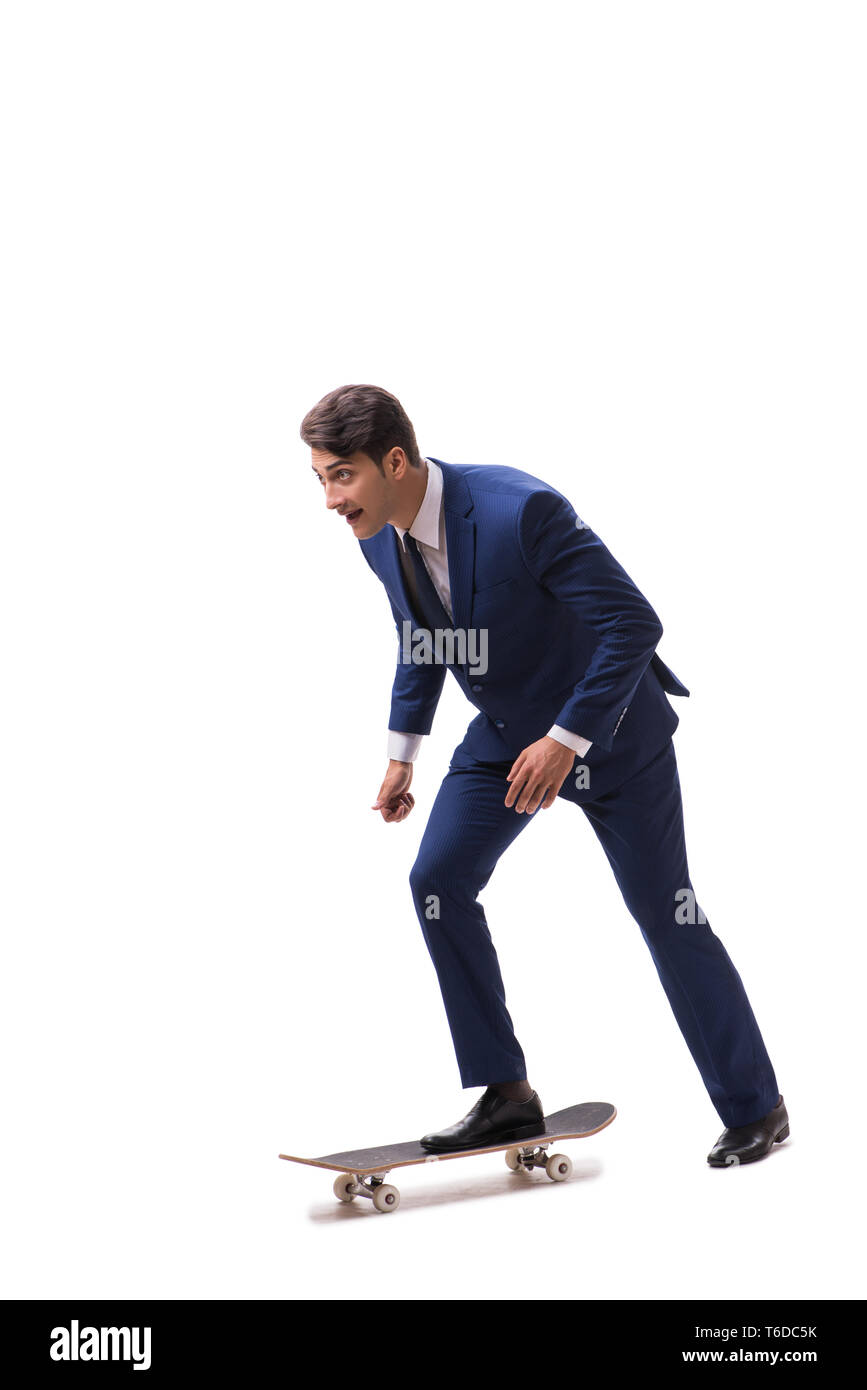 Businessman riding skateboard isolé sur fond blanc Banque D'Images