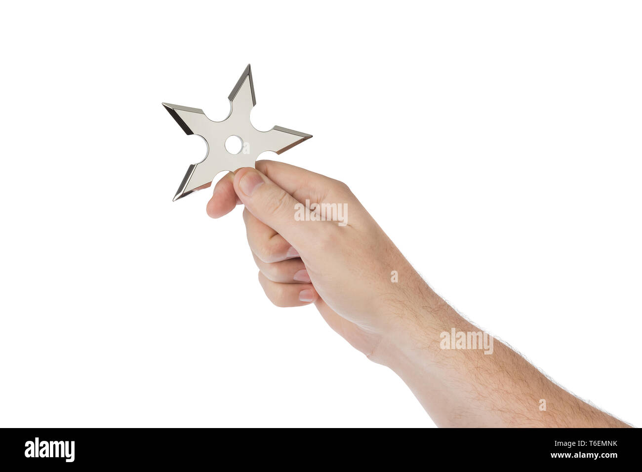 La main est lancer shuriken ninja Banque D'Images