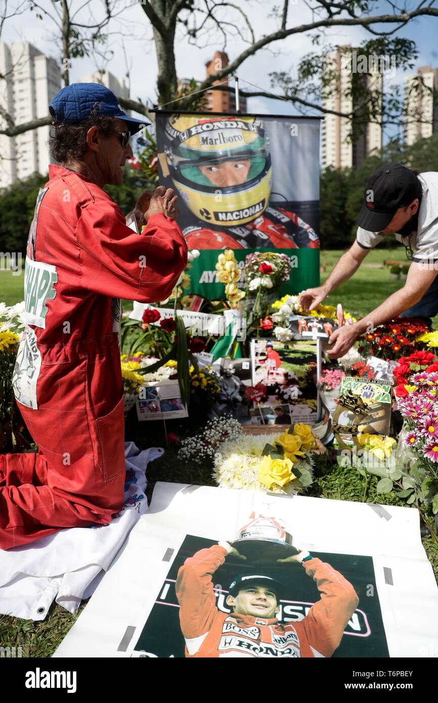 Fans Of Brazilian Formula One Driver Ayrton Senna Pray At His Grave Site In The Morumbi Cemetery In Sao Paulo May 1 04 Senna Died Ten Years Ago Following His Fatal Car
