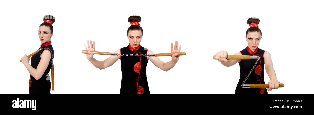 Femme drôle avec nunchucks isolated on white Banque D'Images