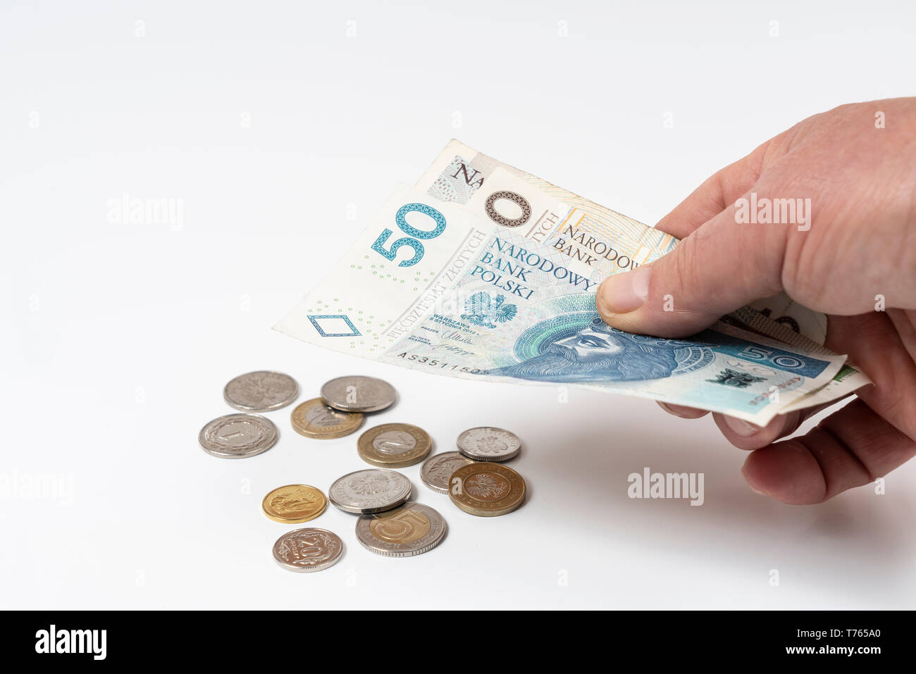 Certains billets et quelques pièces de zloty polonais Banque D'Images