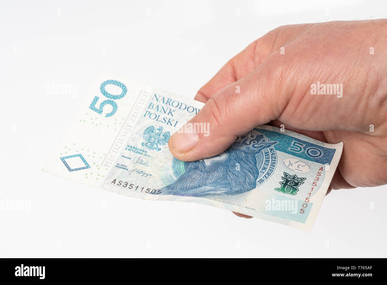 Un billet de 50 zloty polonais sur la main Banque D'Images