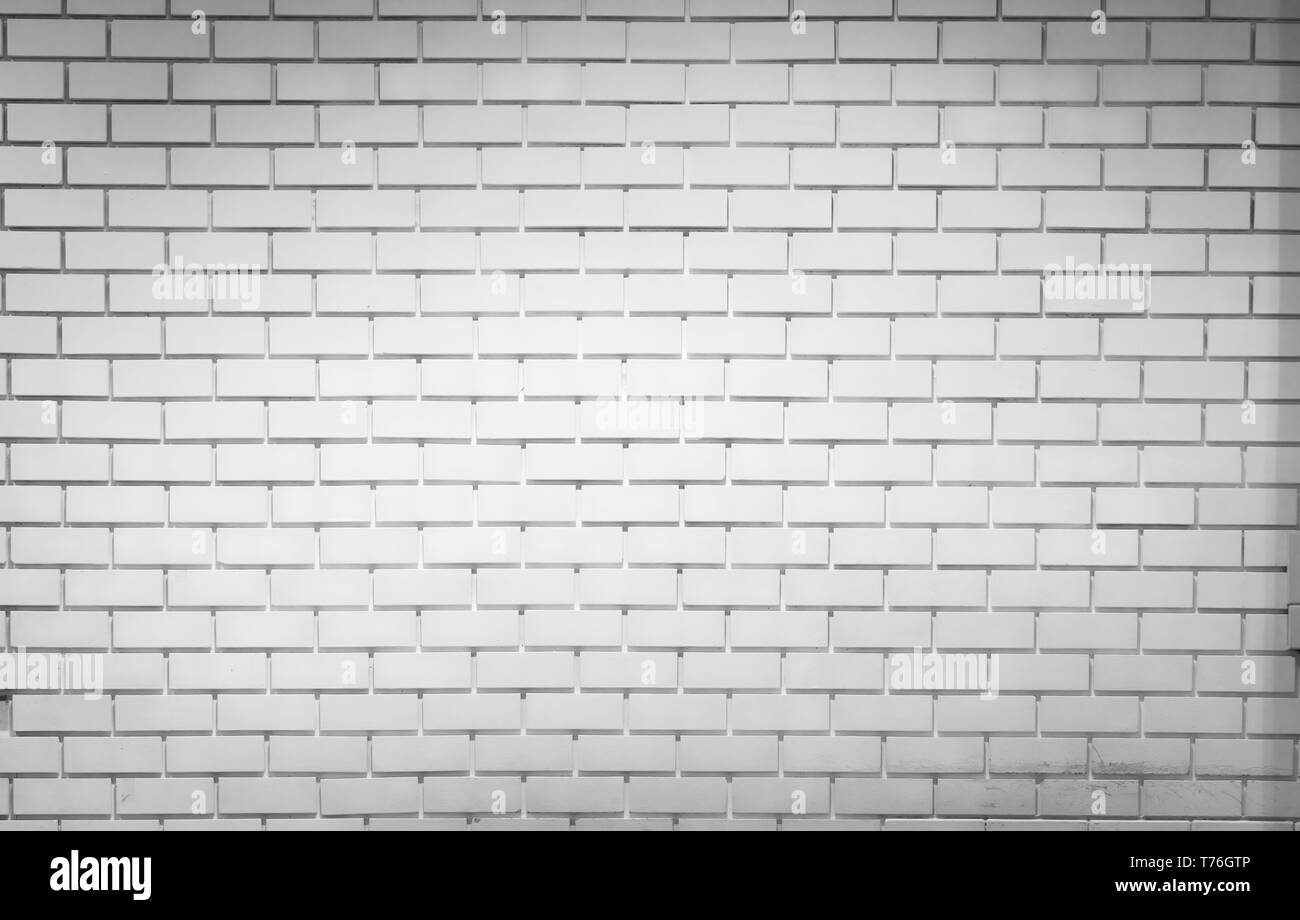 White brick wall texture background avec l'espace pour le texte. Papier peint en brique blanche. Accueil décoration intérieure. Concept de l'architecture. Mur blanc vide pour Banque D'Images