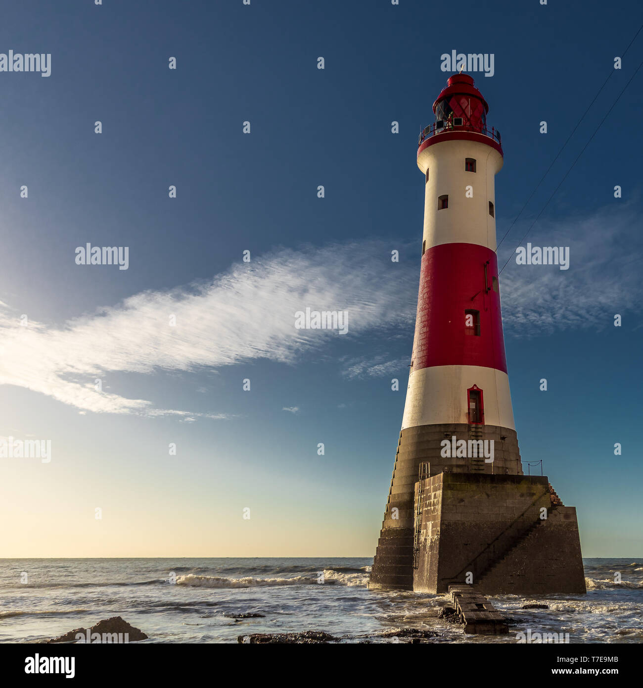 BEACHY HEAD LIGHTHOUSE AU LEVER DU SOLEIL Banque D'Images