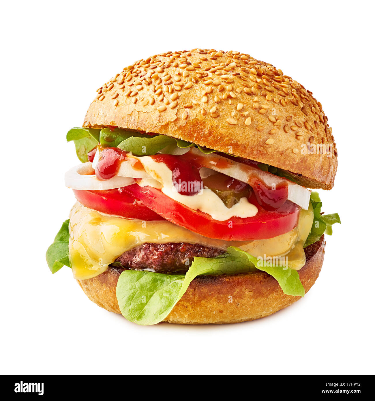 Hamburger juteux avec fromage sur fond blanc Banque D'Images